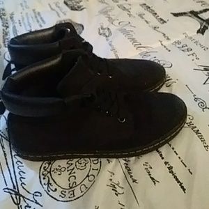 Dr Martens. Womens black canvas high top shoes